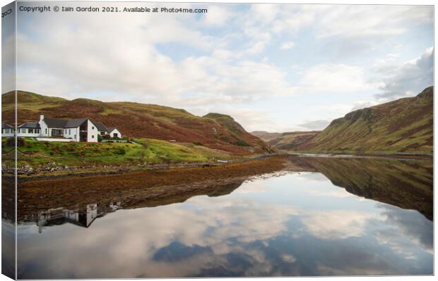 White House overlooking Tranquil Loch Isle of Skye Scotland Canvas Print by Iain Gordon