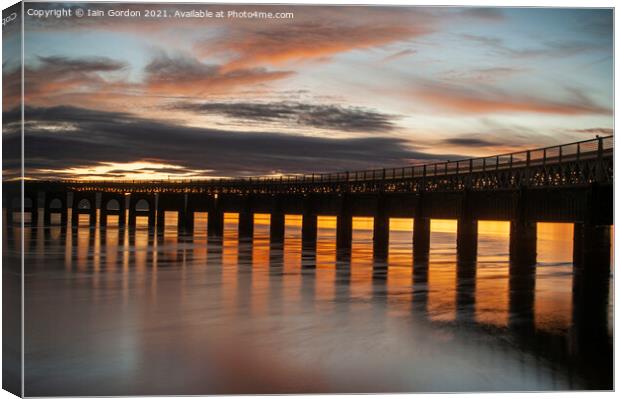 Sunset over the Tay Rail Bridge Dundee Scotland Canvas Print by Iain Gordon
