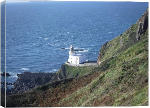 Hartland Point Lighthouse Canvas Print by Susan Harrison