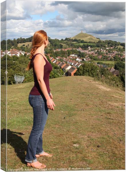 Admiring the view of Glastonbury Tor from Wearyall Canvas Print by Robert MacDowall