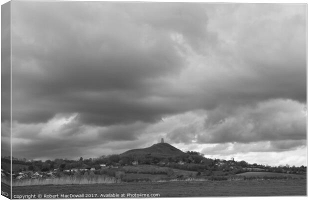 Storm clouds gather over Glastonbury Tor Canvas Print by Robert MacDowall
