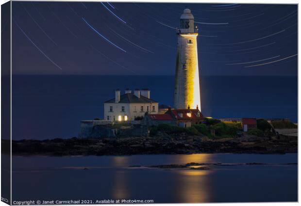 Enchanting Nighttime View of St Marys Lighthouse Canvas Print by Janet Carmichael