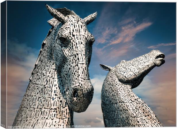 Majestic Kelpies Rising from Scottish Canal Canvas Print by Janet Carmichael