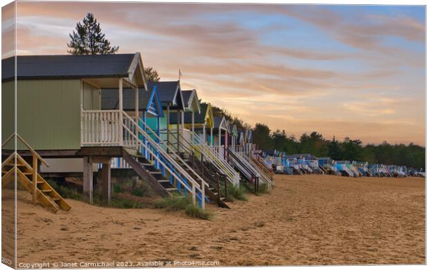 Sunset over Wells Next the Sea Beach Huts Canvas Print by Janet Carmichael