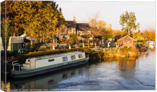 Riverside Charm at Ye Olde Swan Inn Canvas Print by Janet Carmichael