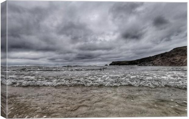 Stormy beach with waves Canvas Print by Ollie Hully
