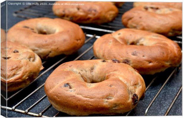 freshly cooked cinnamon and raisin bagels  Canvas Print by Ollie Hully