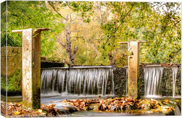 Waterfall into the lake Canvas Print by Clare Edmonds
