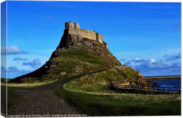 The Holy Island of Lindisfarne Canvas Print by Rob McAvoy