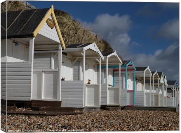 Beachhuts of Bexhill. Canvas Print by Mark Ward