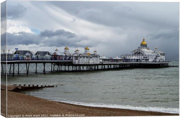 Eastbourne Pier on a cloudy March morning. Canvas Print by Mark Ward
