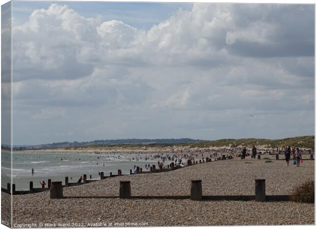 August Bank Holiday at Camber Sands. Canvas Print by Mark Ward