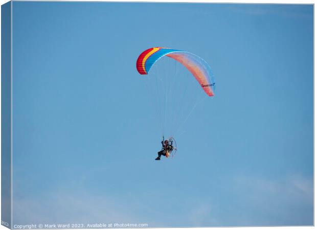 Powered Paragliding over Bexhill. Canvas Print by Mark Ward