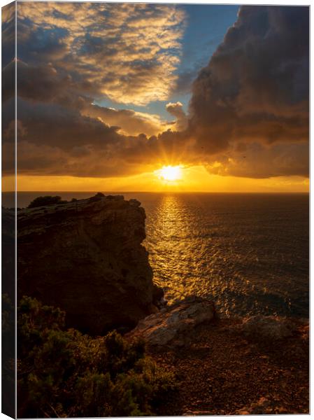 Photography with the sunrise sun between the clouds and the sea of Ibiza Canvas Print by Vicen Photo