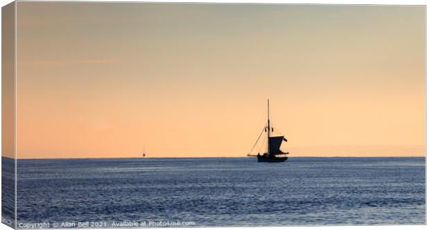 Sloop in early morning light Canvas Print by Allan Bell