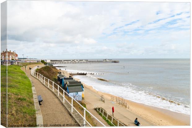 Southwold seafront view of beach huts and pier  Canvas Print by Allan Bell