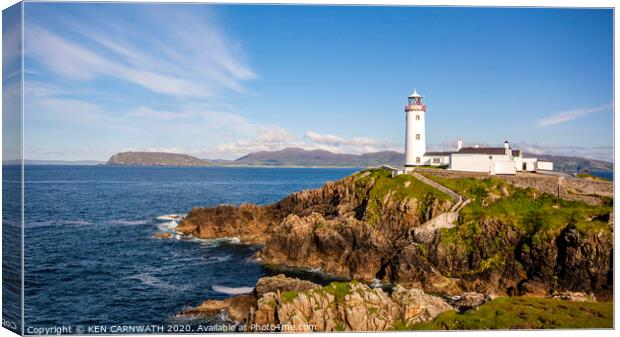 "Guiding Light of Fanad: A Timeless Beacon" Canvas Print by KEN CARNWATH
