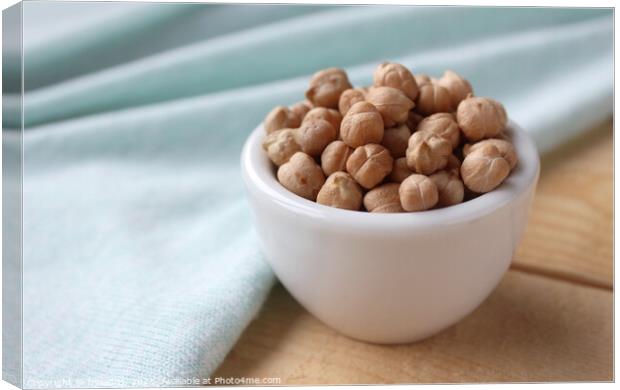 Chickpeas in a white bowl Canvas Print by Imladris 