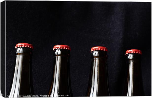 A row of red top beer bottles Canvas Print by Imladris 