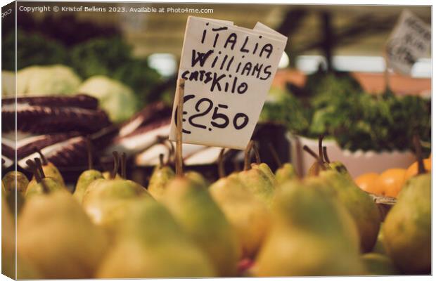 Italian Williams pears with price tag for sale in a market stall. Canvas Print by Kristof Bellens