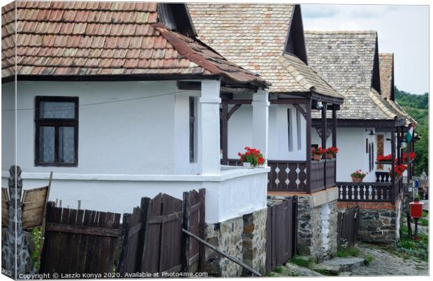 Farmhouses - Holloko Canvas Print by Laszlo Konya