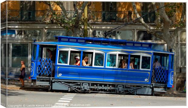 Blue Tram - Barcelona Canvas Print by Laszlo Konya