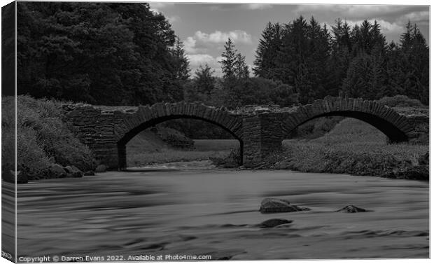 The hidden bridge. Llwyn on reservoir south wales Canvas Print by Darren Evans