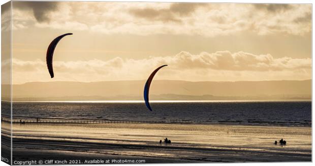 Kite Buggies on golden sands Canvas Print by Cliff Kinch