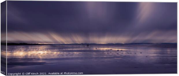 Alone - Abstract view of two people on a wet beach Canvas Print by Cliff Kinch
