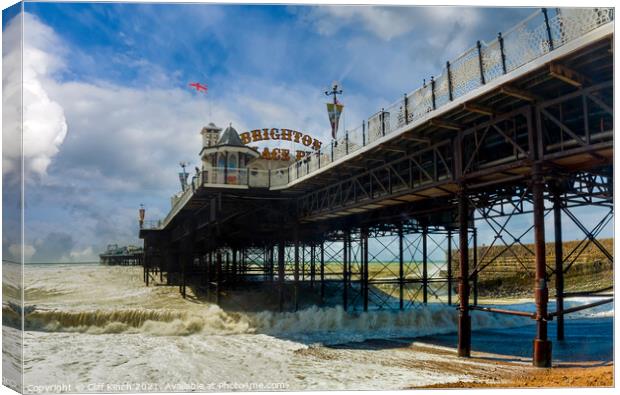 Under Brighton Palace Pier Canvas Print by Cliff Kinch