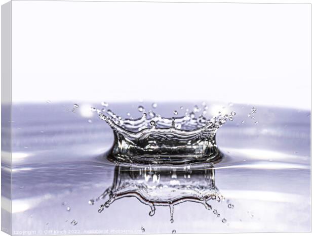 Crown reflection water drop Canvas Print by Cliff Kinch