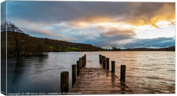 Coniston jetty at sunset Canvas Print by Cliff Kinch