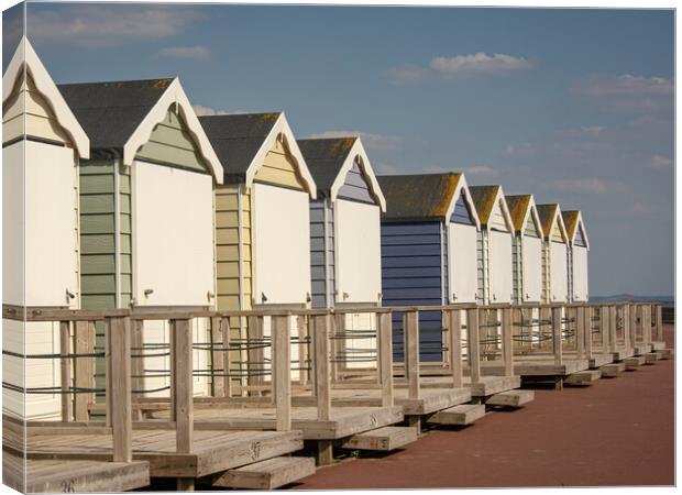 Beach huts on the sea front at Lytham St Annes  Canvas Print by Vicky Outen
