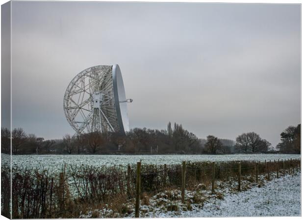Jodrell Bank in a snow covered field  Canvas Print by Vicky Outen