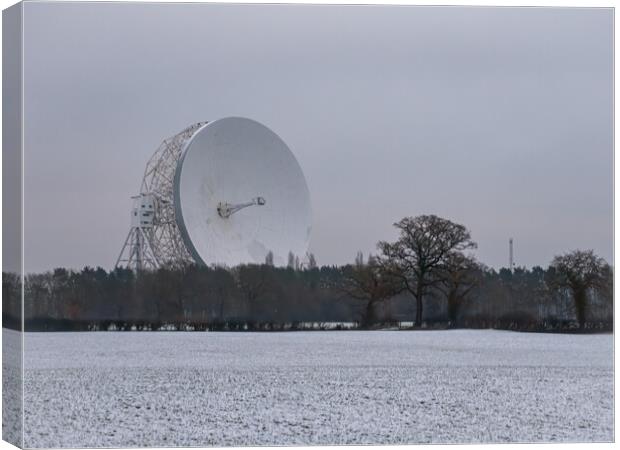 Jodrell Bank in a snow covered field Canvas Print by Vicky Outen