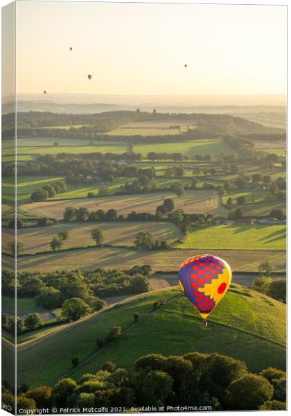 Hot Air Balloons over the English Countryside Canvas Print by Patrick Metcalfe