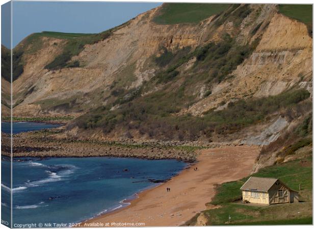 Yellow hut on Eype Beach Canvas Print by Nik Taylor