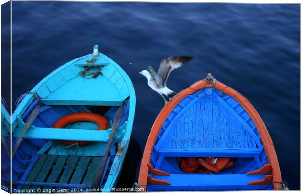 Colorful Fishing Boats and a Little Visitor Canvas Print by Engin Sezer