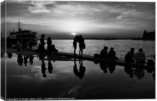 Silhouettes of some young people with beautiful re Canvas Print by Engin Sezer