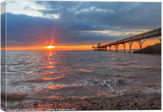 Clevedon Pier with lens flare Canvas Print by Rory Hailes