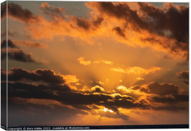 Crepuscular rays over the Bristol channel Canvas Print by Rory Hailes