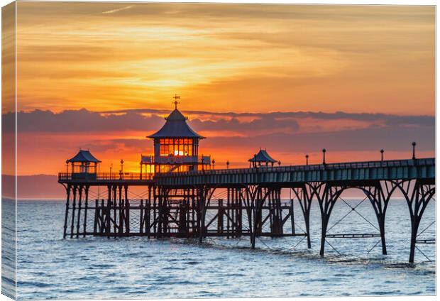 Clevedon Pier with the sun behind the pagoda Canvas Print by Rory Hailes