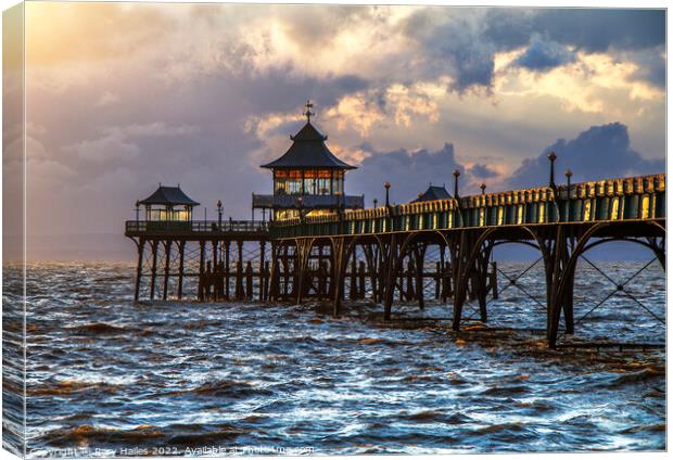 Clevedon Pier at high tide and choppy sea Canvas Print by Rory Hailes