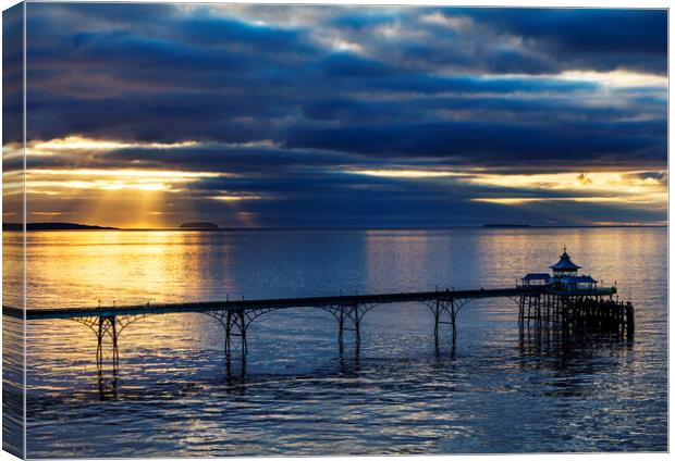 Clevedon Pier on a calm evening at sunset Canvas Print by Rory Hailes