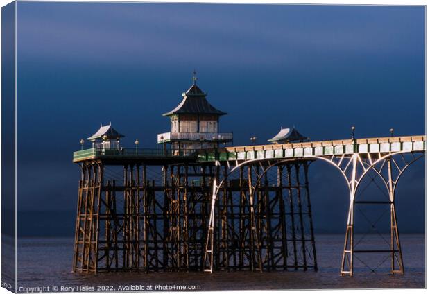 Clevedon Pier. at low tide with moody sky Canvas Print by Rory Hailes