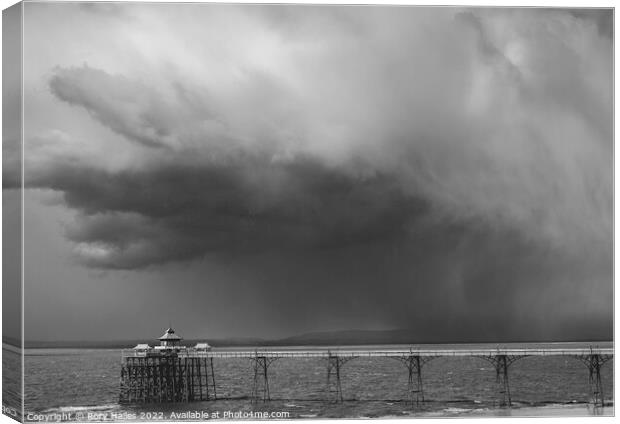 Clevedon Pier on a cold and cloudy day Canvas Print by Rory Hailes