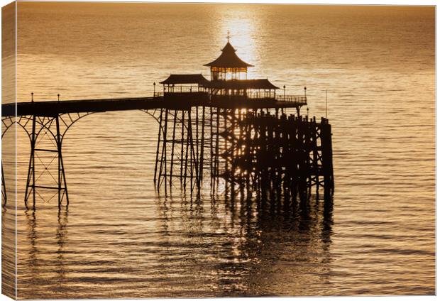 Clevedon Pier at sunset with a calm and tranquil sea Canvas Print by Rory Hailes