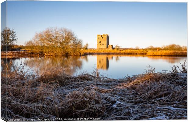 Long exposure of Threave Castle reflecting on the River Dee in t Canvas Print by SnapT Photography