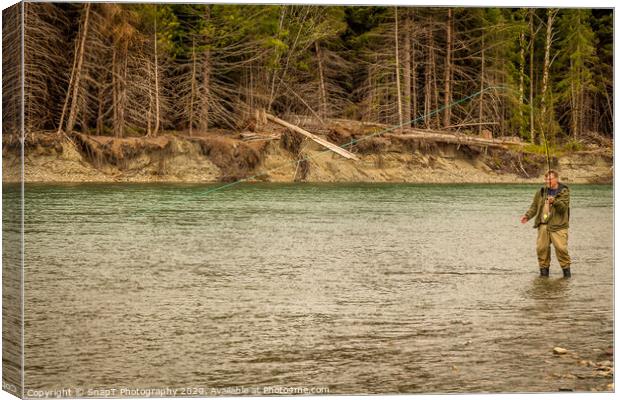 A man hooked into a fish while fly fishing in British Columbia, near Kitimat Canvas Print by SnapT Photography