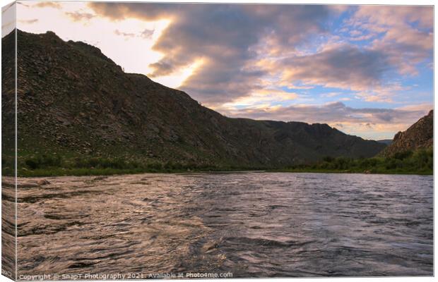Sunset and twlght over a fast flowing river in Mongolia Canvas Print by SnapT Photography